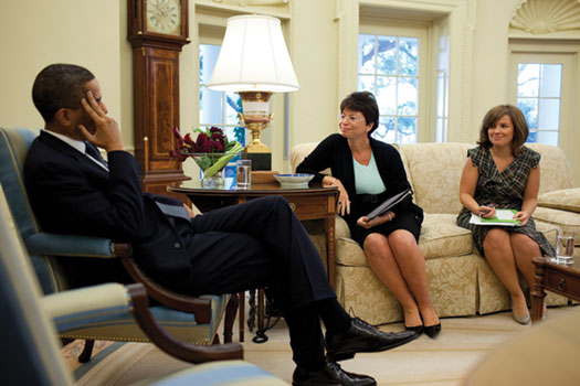 Mastromonaco (right) meets in the Oval Office with President Obama and senior adviser Valeria Jarrett.