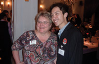 WAA President and CEO Paula Bonner visits with Shawn Li ’04