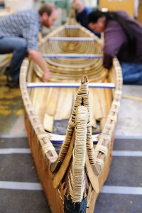 UW students and faculty helped construct this birchbark canoe using  traditional methods, starting with peeling birchbark in the forests around Lac du Flambeau in northern Wisconsin. Photo: Jeff Miller.