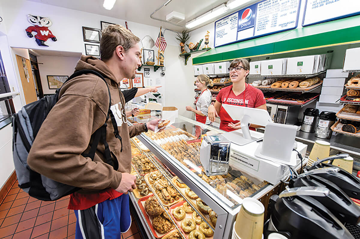 A customer buying donuts