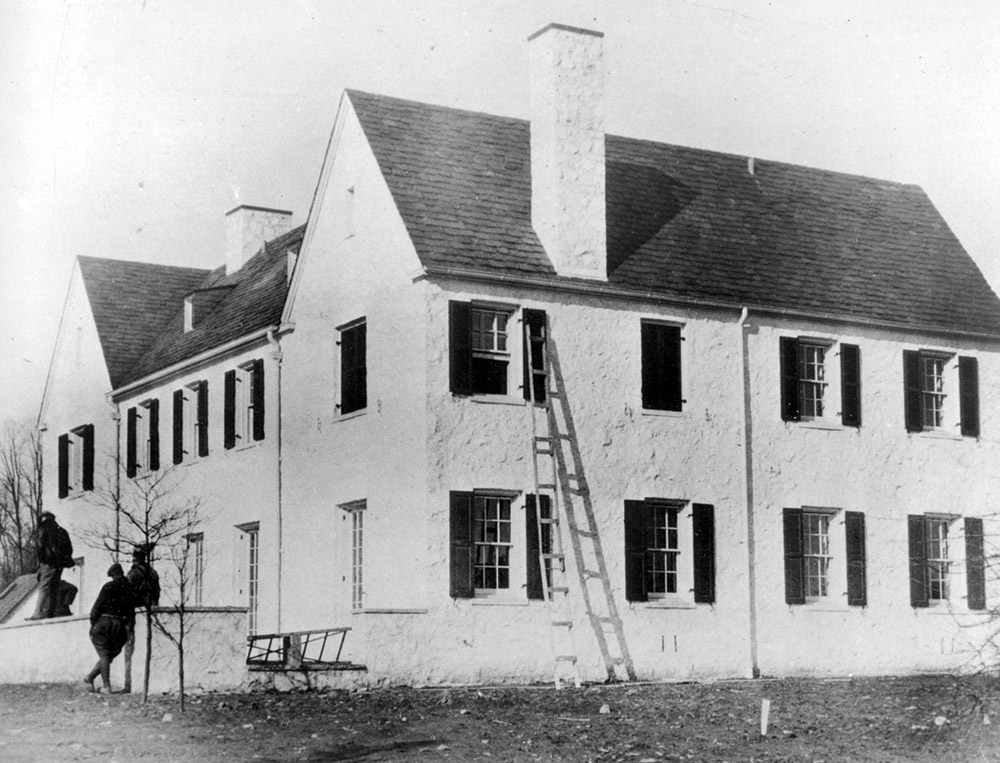 Police — shown below reconstructing details of the child’s disappearance from Lindbergh’s New Jersey estate — exhausted leads from a ransom note and a chisel found at the crime scene before consulting Koehler. AP Photo.