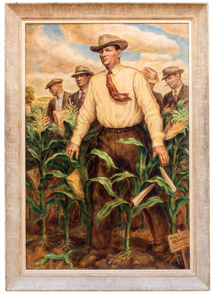 Framed painting of five men, one in foreground and four in background, standing in cornfield.