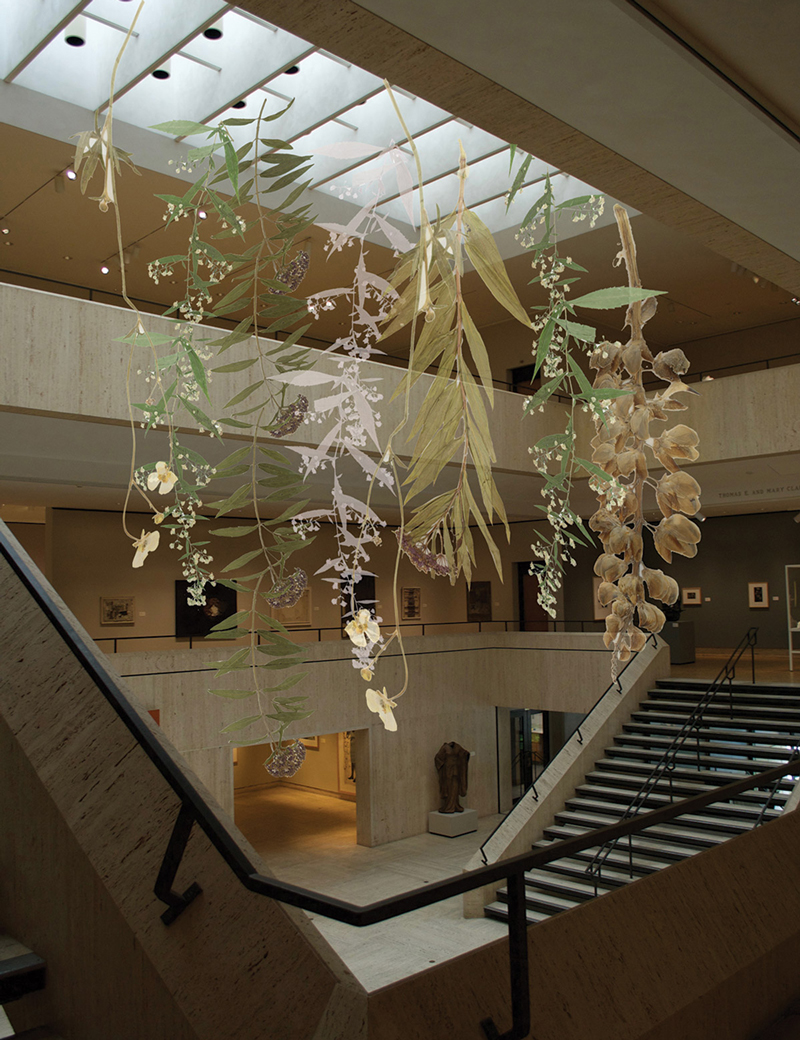 Embroidery installation hung from the Chazen gallery ceiling