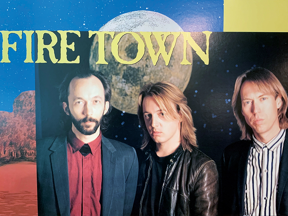 Album cover showing the three members of Fire Town
