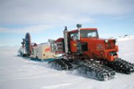The shot-hole drill (shown during a test near McMurdo Station) carves holes in glaciers in Antarctica. It can drill ice at a rate of six meters per minute, cutting up to twenty holes each day. The drill’s bit is made of steel and tungsten, but the key element is compressed air, used to drive the drill, suspend it over the ice, and clear chips out of the hole.