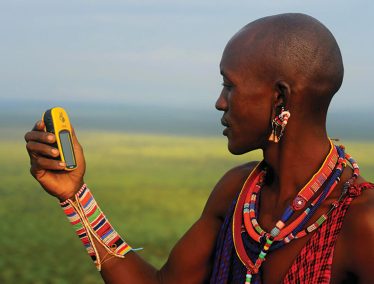 A tribal warrior using GPS technology