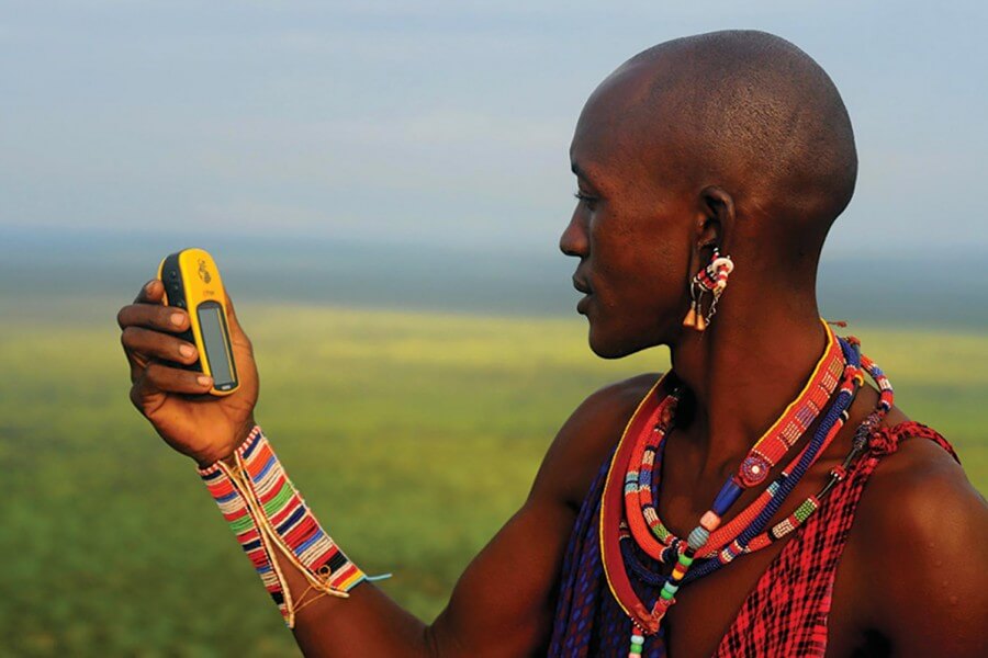 A tribal warrior using GPS technology