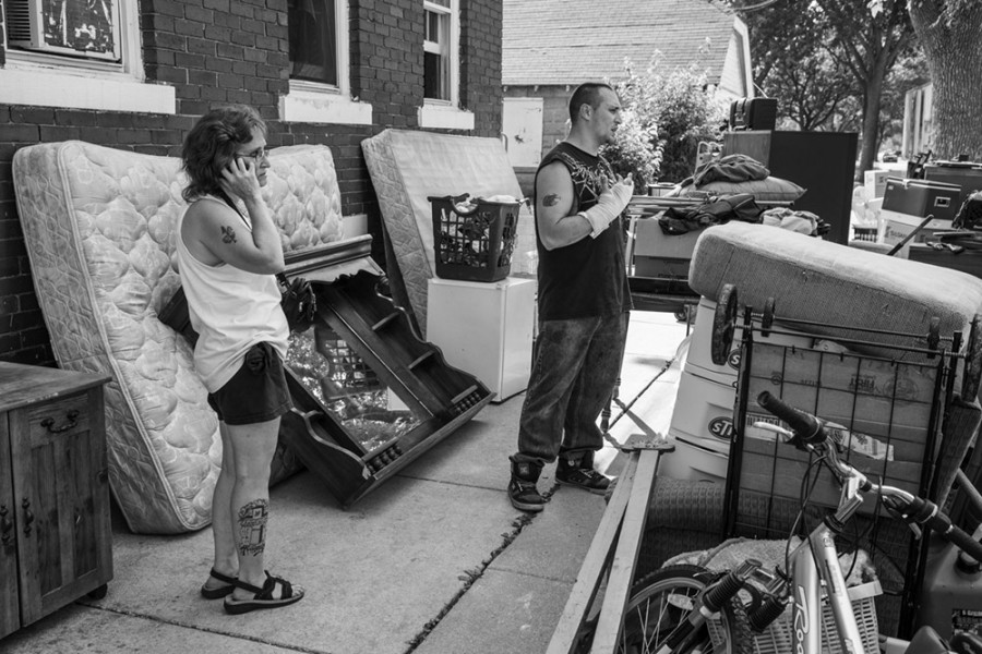 When this mother and son were evicted, she called a relative to come and help them move their belongings.