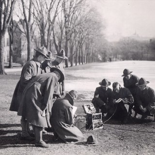 Radio telegraphers work in the “field” on Bascom Hill. President Birge worried about the long-term effects of the university turning itself over to the war effort. “The fundamental question for the university of the future is whether the University will return to its former condition when peace comes or whether the vocational and technical work will continue to predominate,” he said in 1918. “The war has shown the country the value of this work as never before, and there will be a strong pressure to over-emphasize it at the expense of liberal studies.” <span class=
