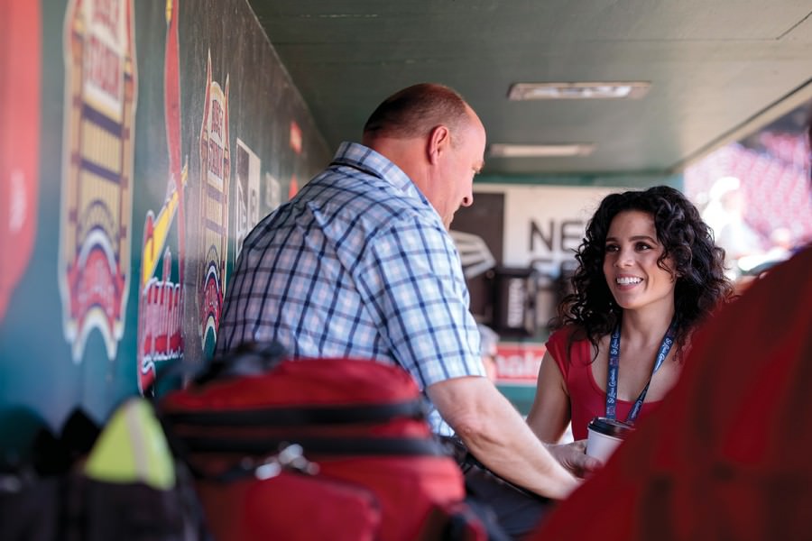 Noboa-Chehade &#8212; above in the Cardinals dugout with Director of Communications Brian Bartow &#8212; joined the club last year when the league mandated that teams with Spanish-speaking players hire full-time translators.