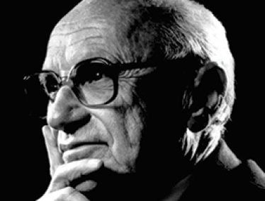 Black and white closeup photo of Milton Friedman.