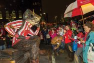 Crowd admires life-sized statue of Bucky Badger.
