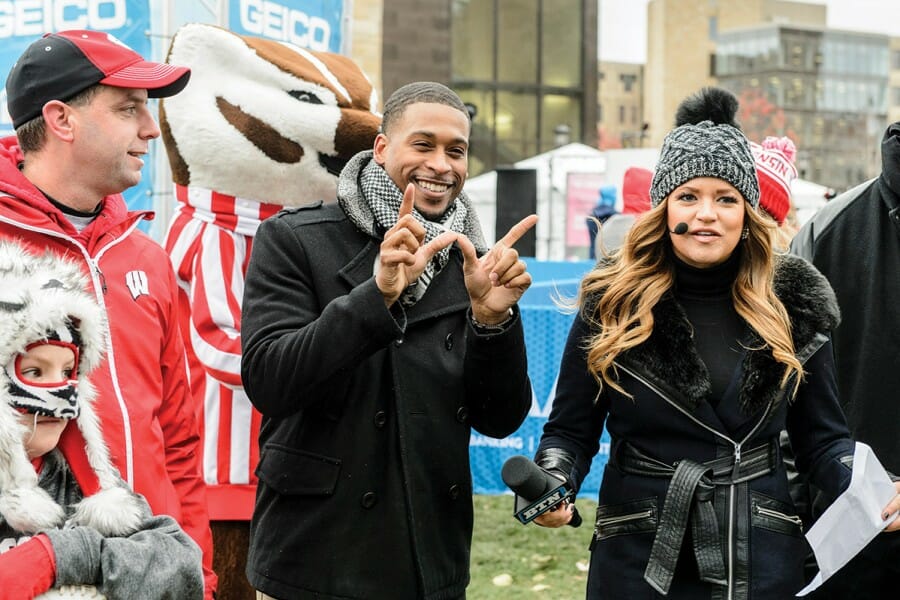 Williams and BTN reporter Michelle McMahon mingle with Badger football fans at a BTN Tailgate taping