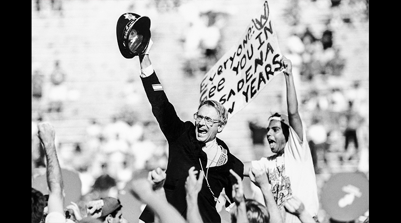 Mike Leckrone among cheering fans at Camp Randall Stadium on October 3, 1992