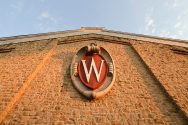 "W" crest displayed on the side of the UW-Madison Field House