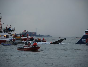 Rescue boats surround US Airways Flight 1549 on the Hudson River