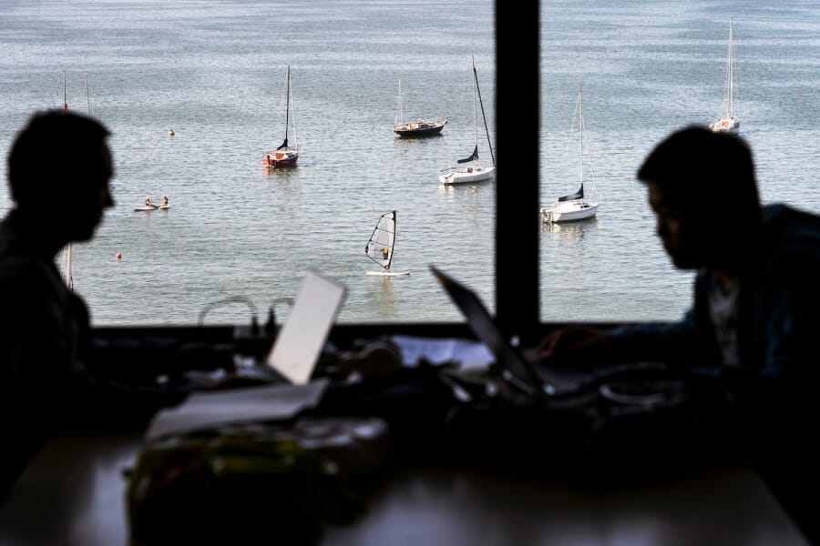 View out of one of the windows in Helen C. White hall shows sailboats on Lake Mendota