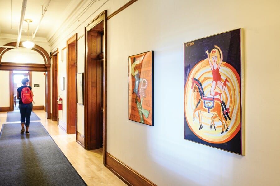 Bascom Hall hallway lined with paintings