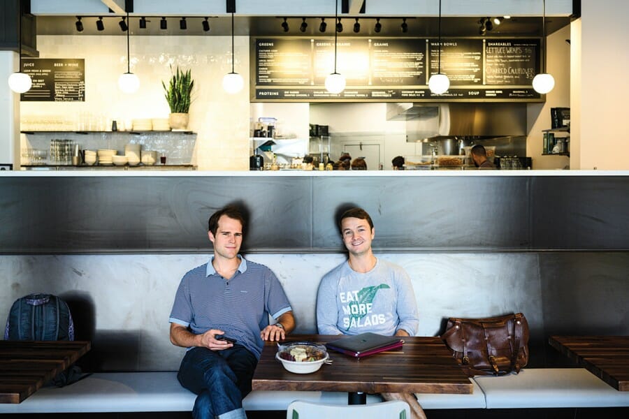 Henry Aschauer and Doug Hamaker seated in their restaurant