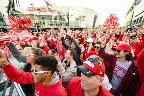Badger fans cheer during a pep rally at LA Live
