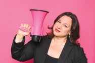 Veronica Rueckert holding a pink megaphone