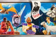 Colorful mural depicting a variety of famous people