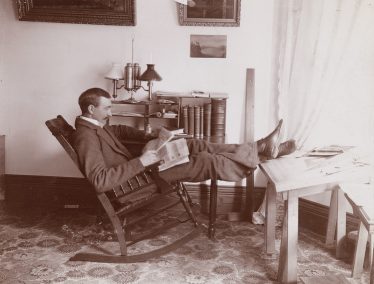 Edward Schildhauer reading newspaper