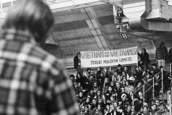 Students hold banners protesting the Vietnam war during a rally