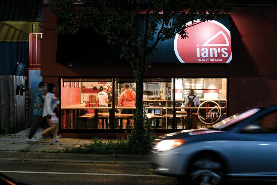 Exterior of Ian's Pizza at night