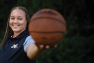 Tamara Moore holding a basketball