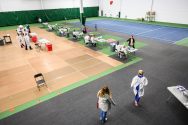 Members of the Madison community receive COVID-19 testing at the Nielsen Tennis Center