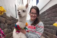 Katie Lorenz holding an alpaca