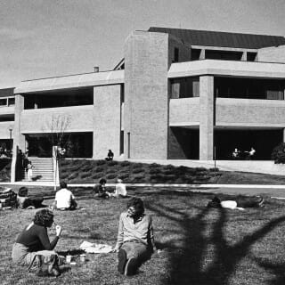 Black and white photo of students outside the old Union South during the 1970s