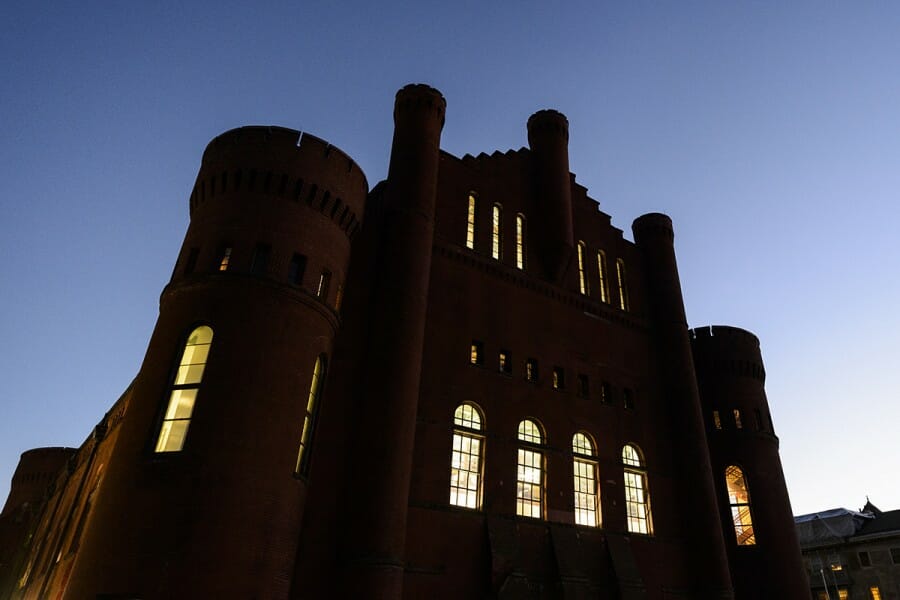 Exterior of Red Gym illuminated at nighttime