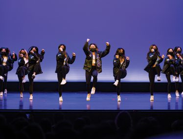 Dancers perform onstage at the Multicultural Homecoming Yard Show