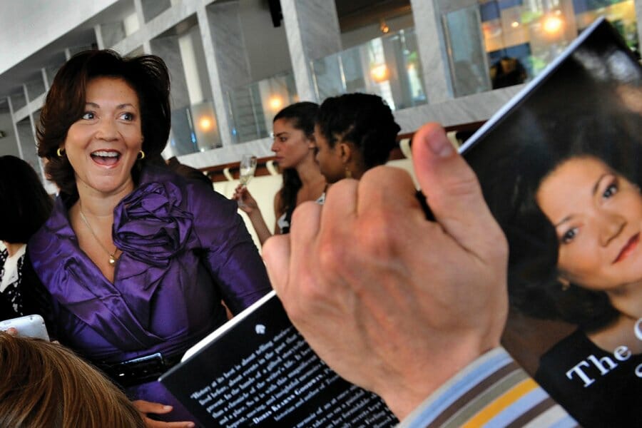 Michele Norris happily greets fans at a book signing in 2010
