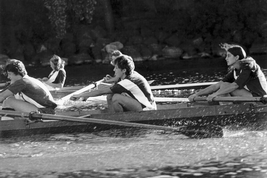 1970s black and white photo of the UW women's rowing team