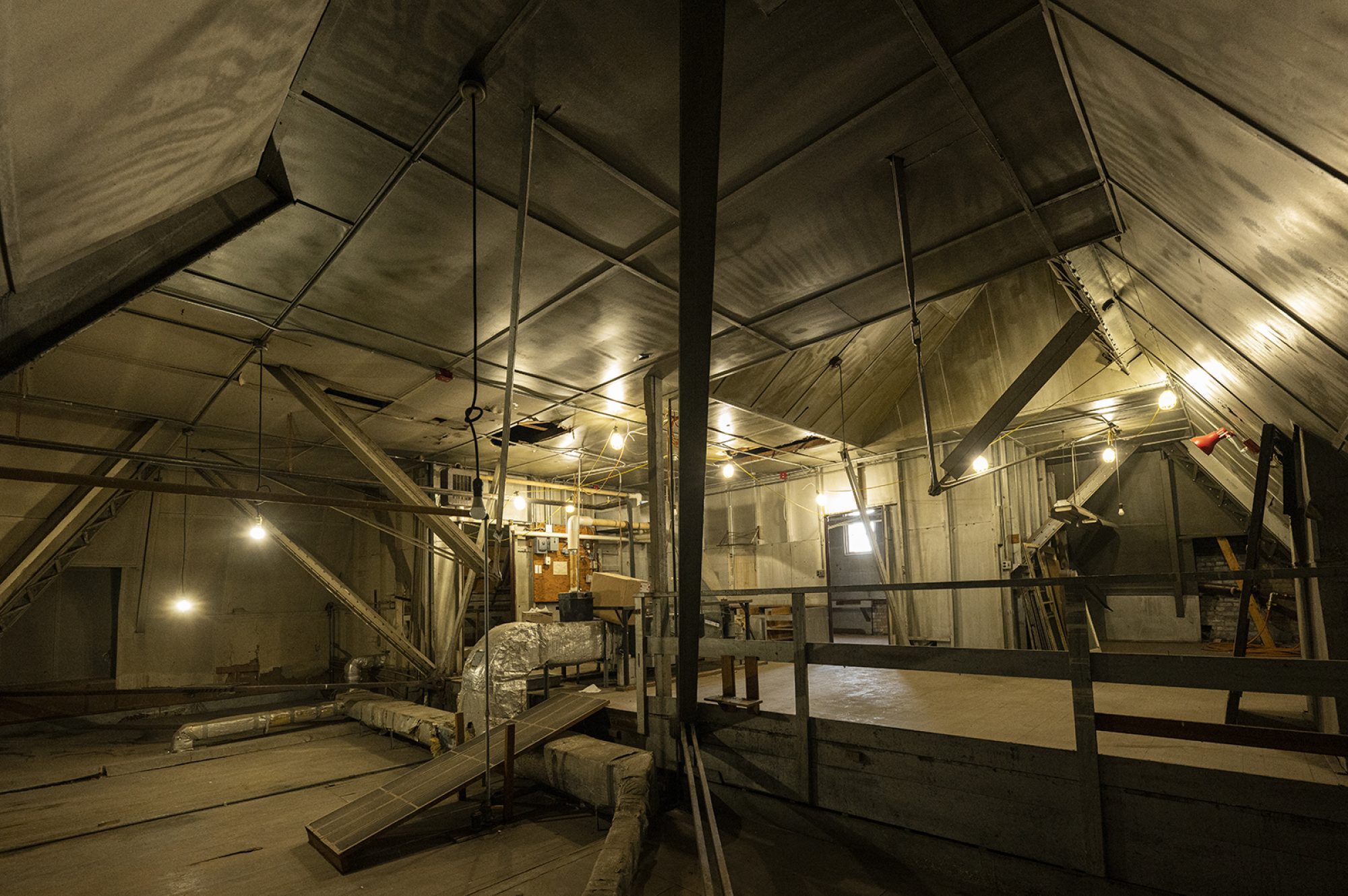 Wide shot of the Science Hall Attic showing the interior roofline and rafters