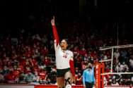 Devyn Robinson celebrates on the volleyball court