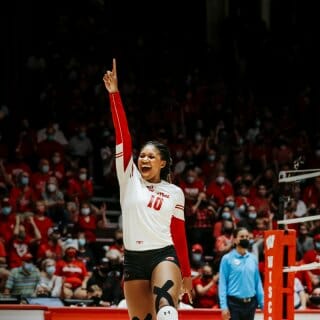 Devyn Robinson celebrates on the volleyball court
