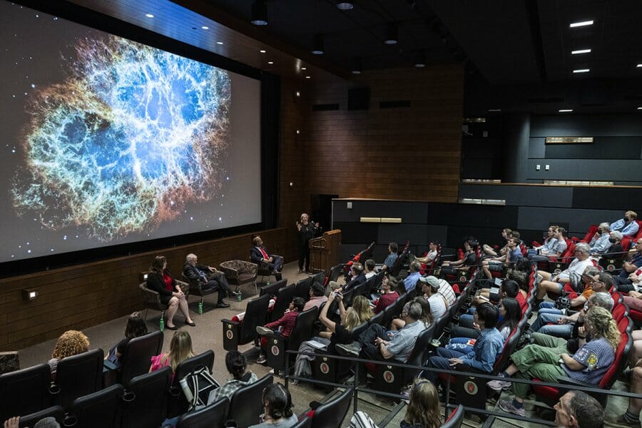 Andrea Ghez, UCLA Professor of Physics and Astronomy and recipient of a 2020 Nobel Prize, speaks to the audience during the “Discover Past, Present and Future: Black Holes, Neutrinos, and Life in Our Galaxy Symposium” held in Union South’s Marquee Theater at the University of Wisconsin-Madison on April 13, 2023. The event is part of Investiture, a series of special campus events planned for April 10-15 to celebrate the university and formally welcome Jennifer L. Mnookin as chancellor and the 30th leader of the UW–Madison. (Photo by Bryce Richter / UW–Madison)