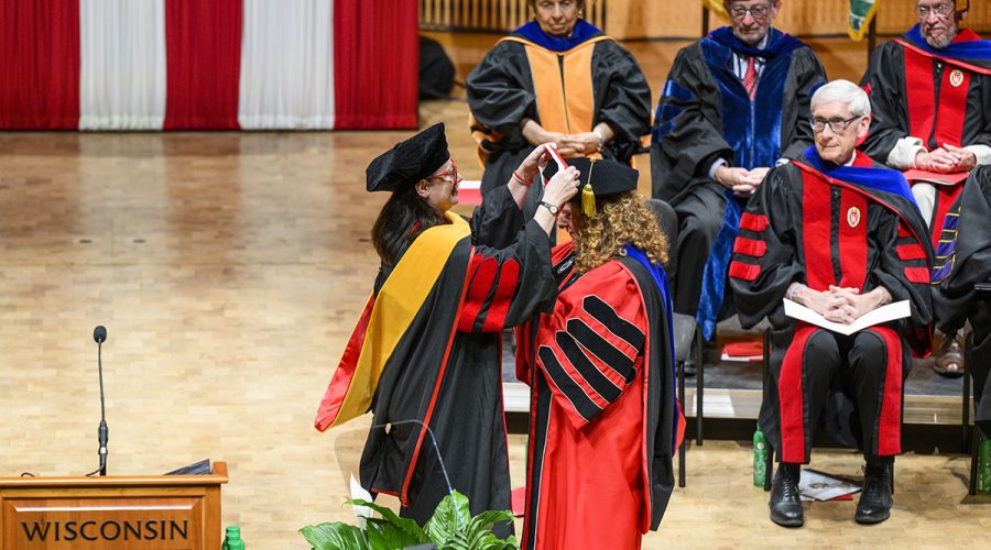 UW System Board of Regents President Karen Walsh places a medallion with the UW–Madison Numen Lumen insignia on Chancellor Jennifer L. Mnookin installing her as the 30th leader of the University of Wisconsin–Madison during an Investiture Ceremony at the Hamel Music Center on April 14, 2023. The event is part of Investiture Week, a series of special campus events planned for April 10-15 to celebrate the university and formally welcome Mnookin as chancellor. (Photo by Jeff Miller / UW–Madison)