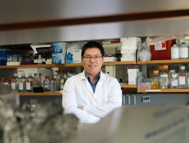 Quanyin Hu in his lab