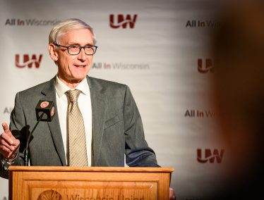 Wisconsin Governor, Tony Evers, speaks at a podium