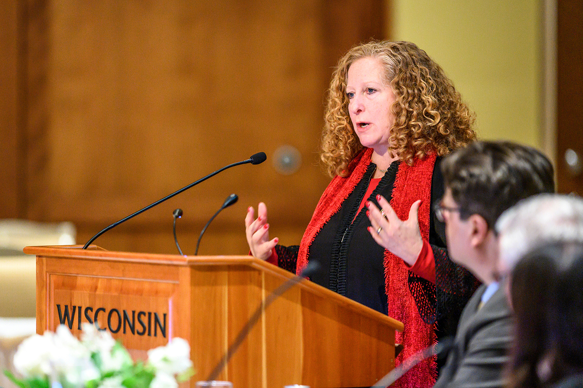 Chancellor Jennifer Mnookin stands at a podium and delivers a speech during a UW Board of Regents meeting