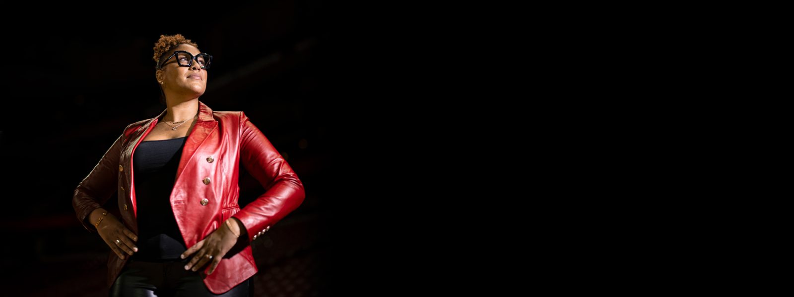 Marisa Mosely wearing a red leather jacket