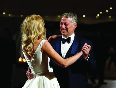 Michael Oglesby dances with his daughter at her wedding
