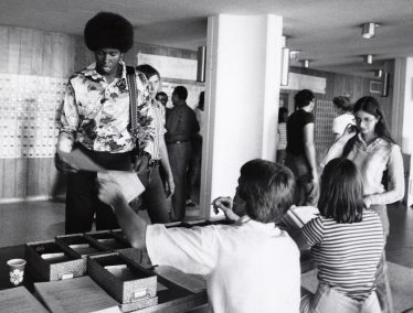 Students receive information as they move in at Ogg Hall in the 1970s.