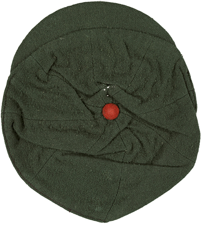 A black beanie with small red center piece.