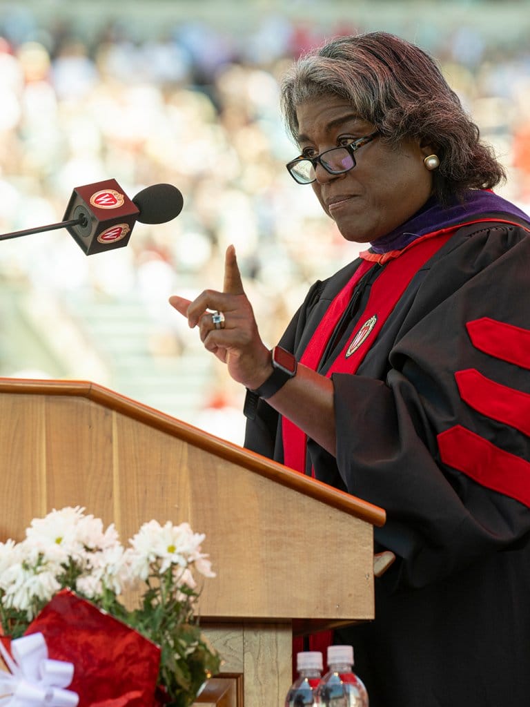 Linda Thomas-Greenfield gestures to the audience while speaking at commencement.